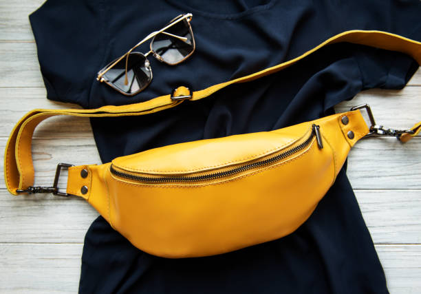 Fashionable stylish belt leather bag in yellow color
